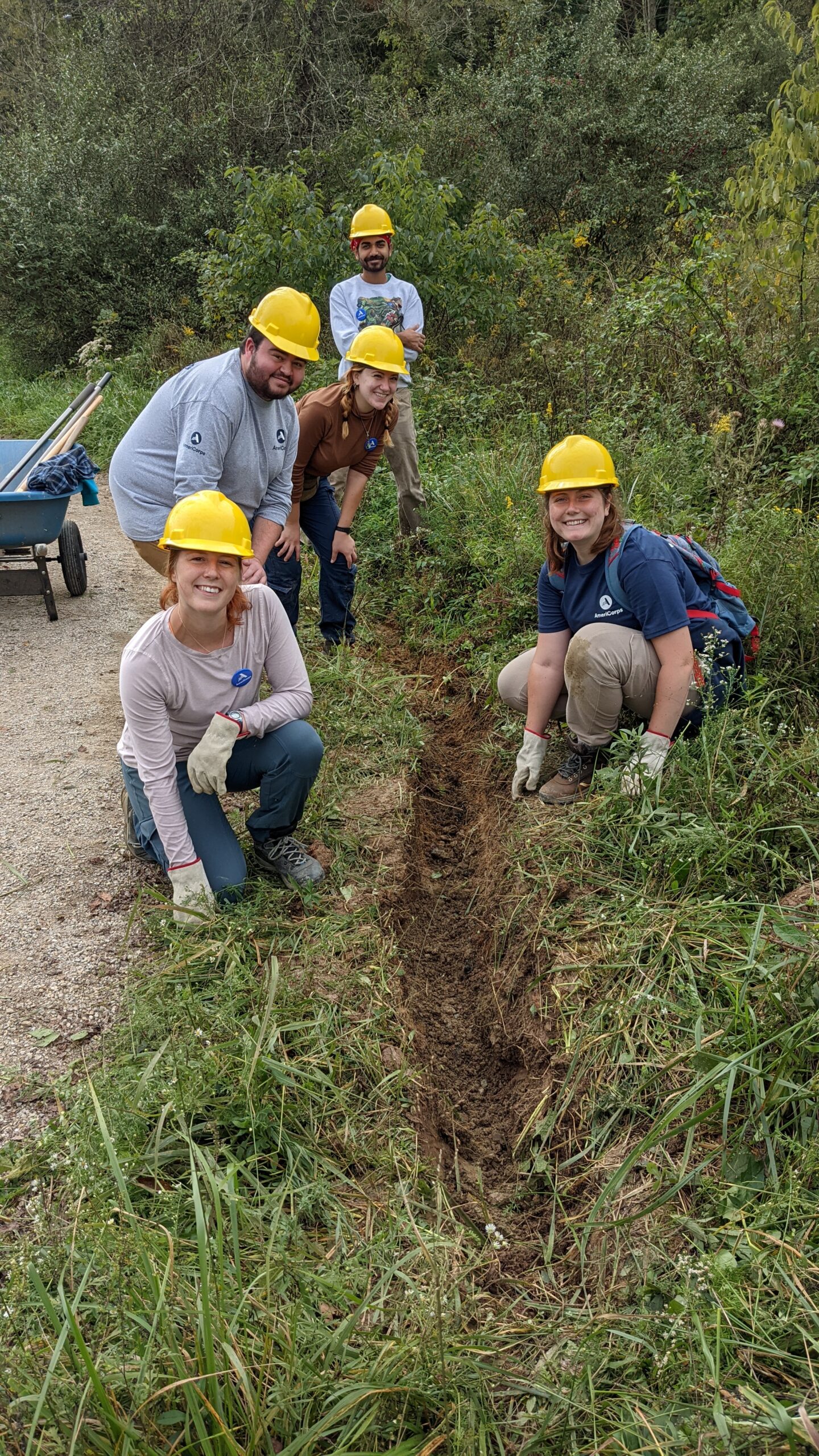 Ohio University student volunteers helping to improve drainage on Chauncey Depot Trail - Baileys Trail System